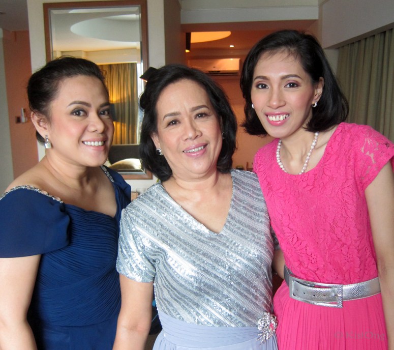 The groom's sister, mother, and sister-in-law.