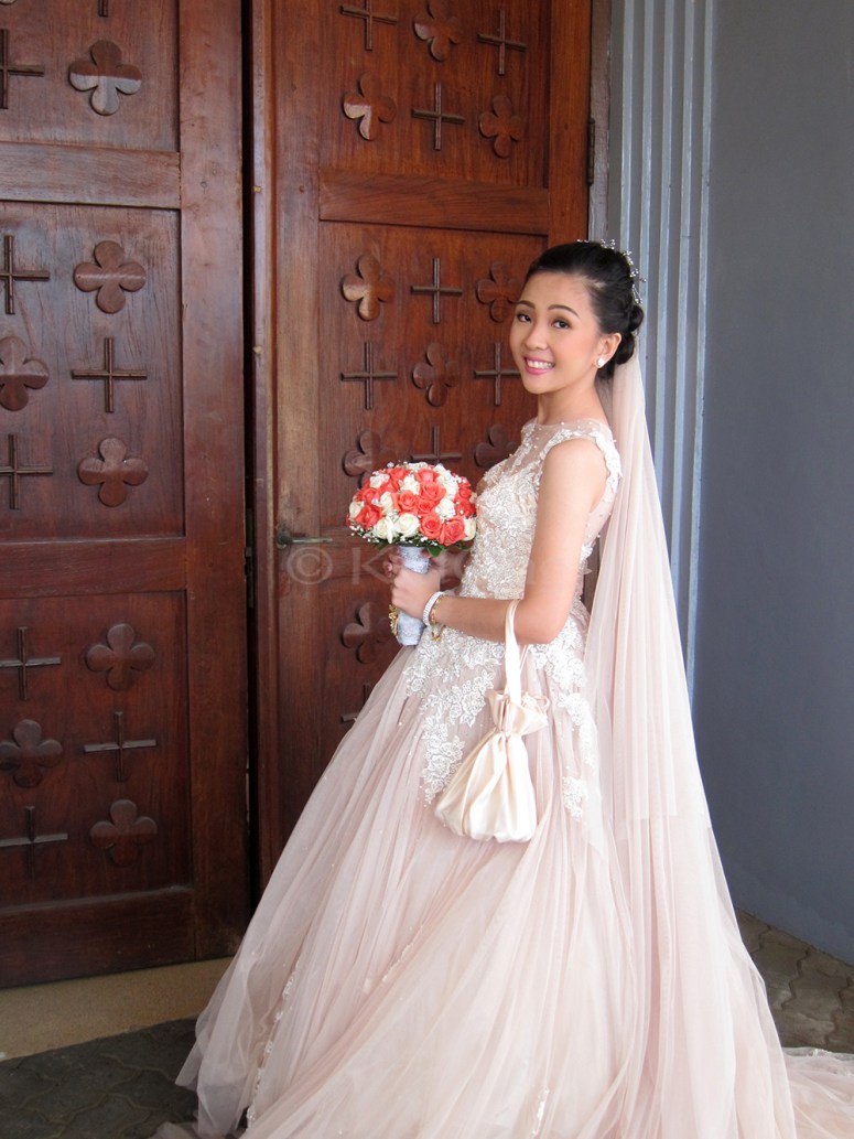 8nancy-behind-church-door